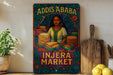 a colorful, vintage-style poster advertising an Injera Market, with a woman depicted in the center surrounded by stacks of bread.