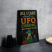 a sign with a humorous message about UFO chasing, accompanied by three cartoon characters.