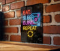 A neon sign on a brick wall that reads "EAT. SLEEP. DJING. REPEAT" with a turntable icon.