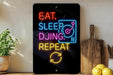 A neon sign with the text "EAT. SLEEP. DJING. REPEAT" is displayed on a wall, accompanied by a wooden cutting board and a potted plant.