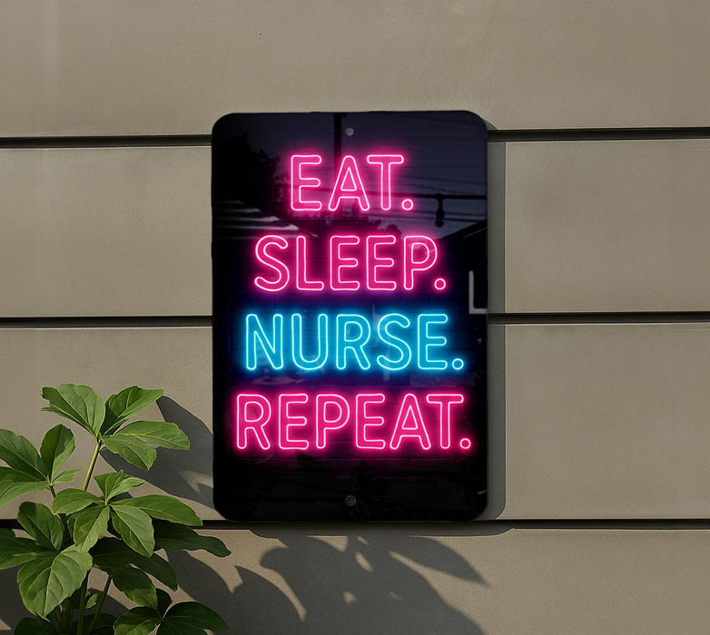 a neon sign with the message "EAT. SLEEP. NURSE. REPEAT." displayed on a wall.