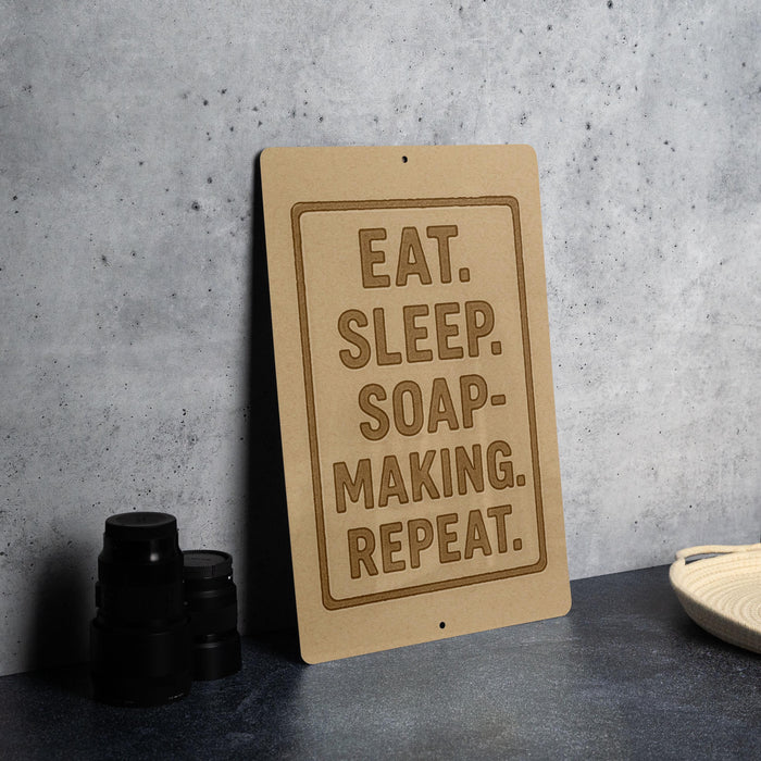 a sign with the message "EAT. SLEEP. SOAP-MAKING. REPEAT."