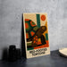 A metal sign with a colorful illustration of a red-footed tortoise, placed on a table next to some black camera lenses.