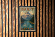 A vintage-style poster of Banff National Park, Canada, featuring a mountain landscape with a lake in the background.