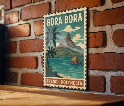 A vintage-style poster of Bora Bora, a tropical island in French Polynesia, is displayed on a brick wall.