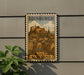 A vintage-style metal sign with an illustration of Edinburgh, Scotland, mounted on a wall.
