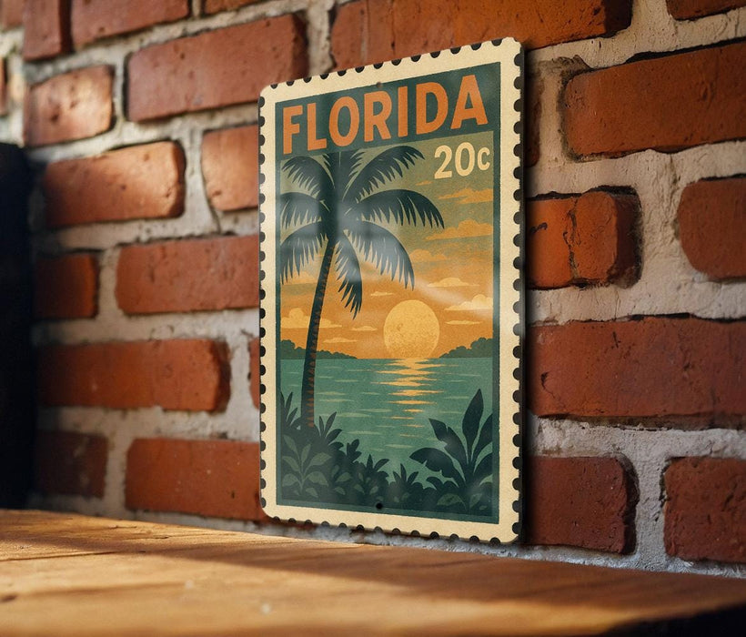 A vintage-style postage stamp depicting a tropical beach scene with palm trees, a sunset, and a body of water.