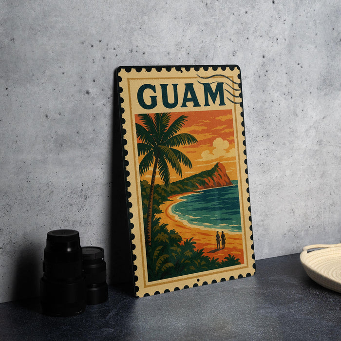 A vintage-style metal stamp depicting a tropical beach scene with palm trees, a sunset, and a couple walking along the shore.