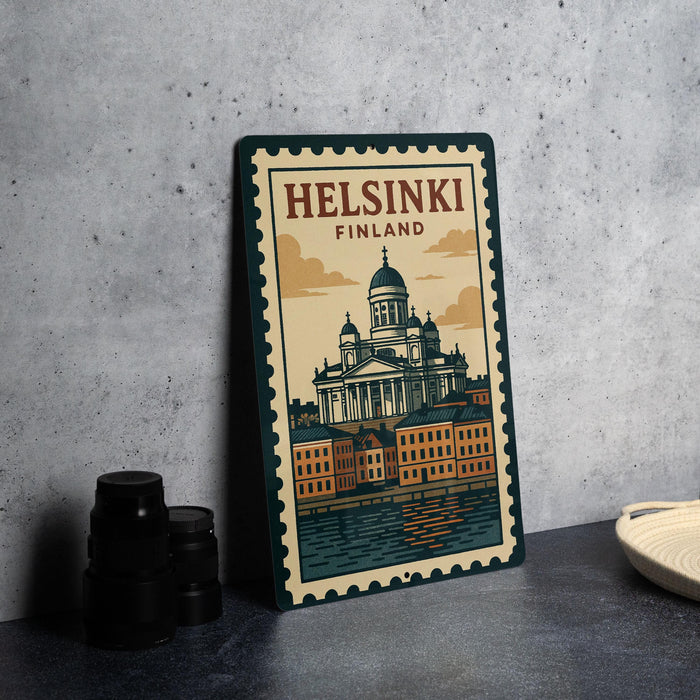 A metal poster featuring the Helsinki Cathedral in Finland, with a vintage-style illustration of the city's architecture.