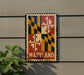 A sign displaying the state of Maryland, featuring the state's flag design.