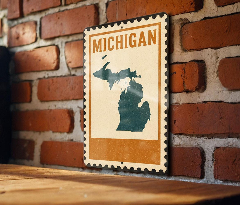 A vintage-style metal sign with the word "MICHIGAN" printed on it, mounted on a brick wall.
