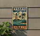 A vintage-style sign for Nassau, Bahamas, featuring a lighthouse and palm trees, is displayed on a wall.