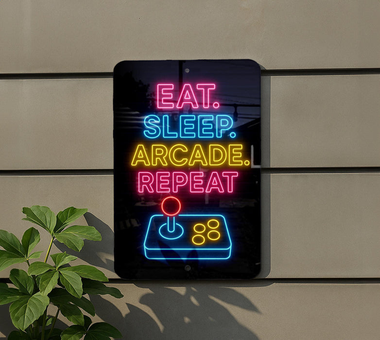 A neon sign on a wall that reads "EAT. SLEEP. ARCAKE. REPEAT" with a joystick icon below it.
