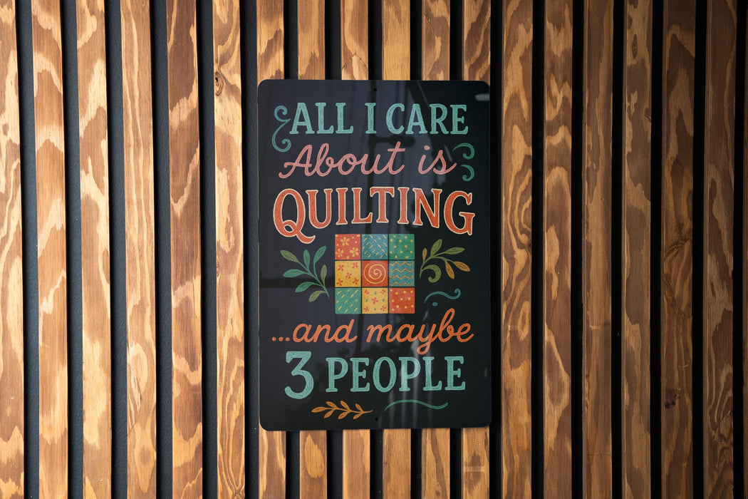 a sign with a humorous message about quilting and possibly 3 people.