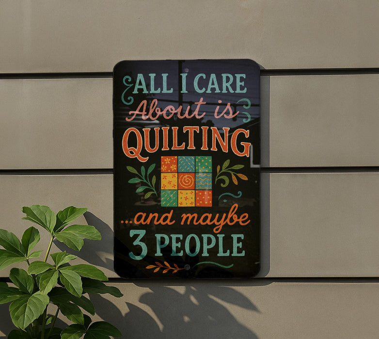 a sign with a humorous message about quilting and possibly 3 people.