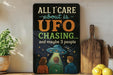 a humorous sign with the text "All I care about is UFO chasing... and maybe 3 people" along with an illustration of three people looking up at a UFO.