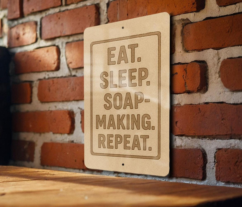 a wooden sign with the text "EAT. SLEEP. SOAP-MAKING. REPEAT."