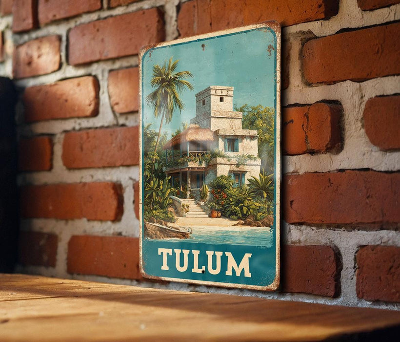 A vintage-style metal sign with a tropical scene of a house and palm trees, mounted on a brick wall.