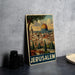 A vintage-style metal poster depicting the city of Jerusalem, with the city's iconic dome and buildings visible.