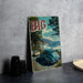 A vintage-style metal sign with a scenic coastal landscape featuring a car and palm trees, with the text "BIG Sur" prominently displayed.