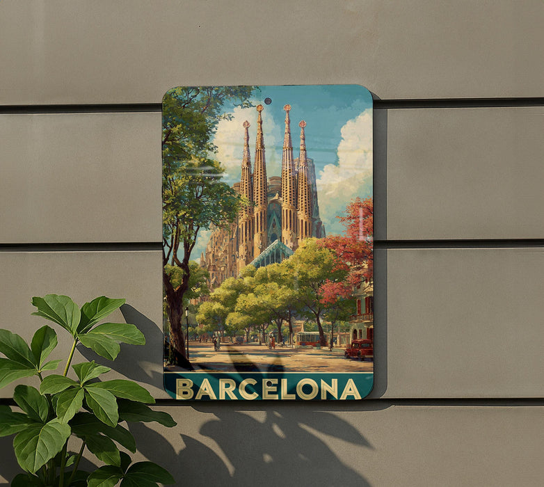A metal sign displaying a picture of the Sagrada Familia, a famous Roman Catholic church in Barcelona, Spain.