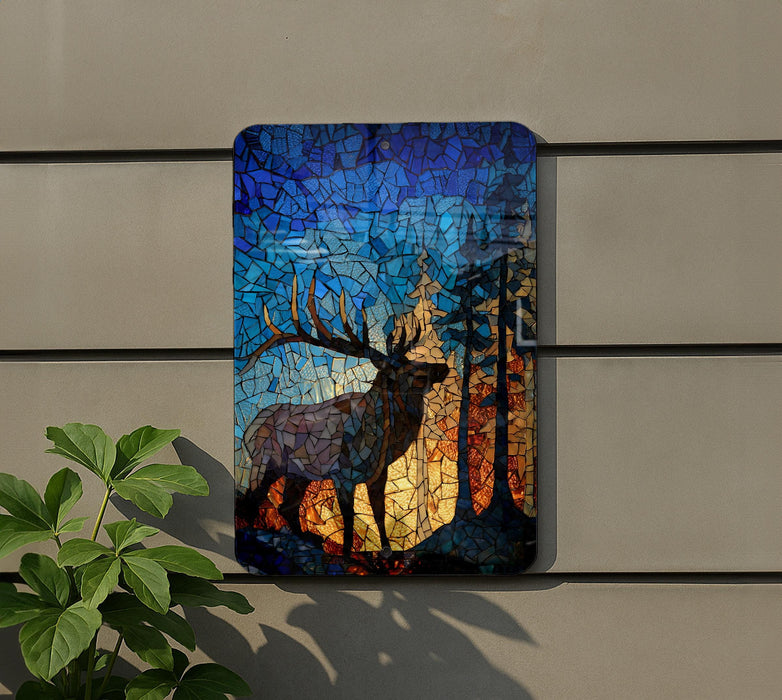 a large, colorful mosaic of a deer with antlers, mounted on a wall.