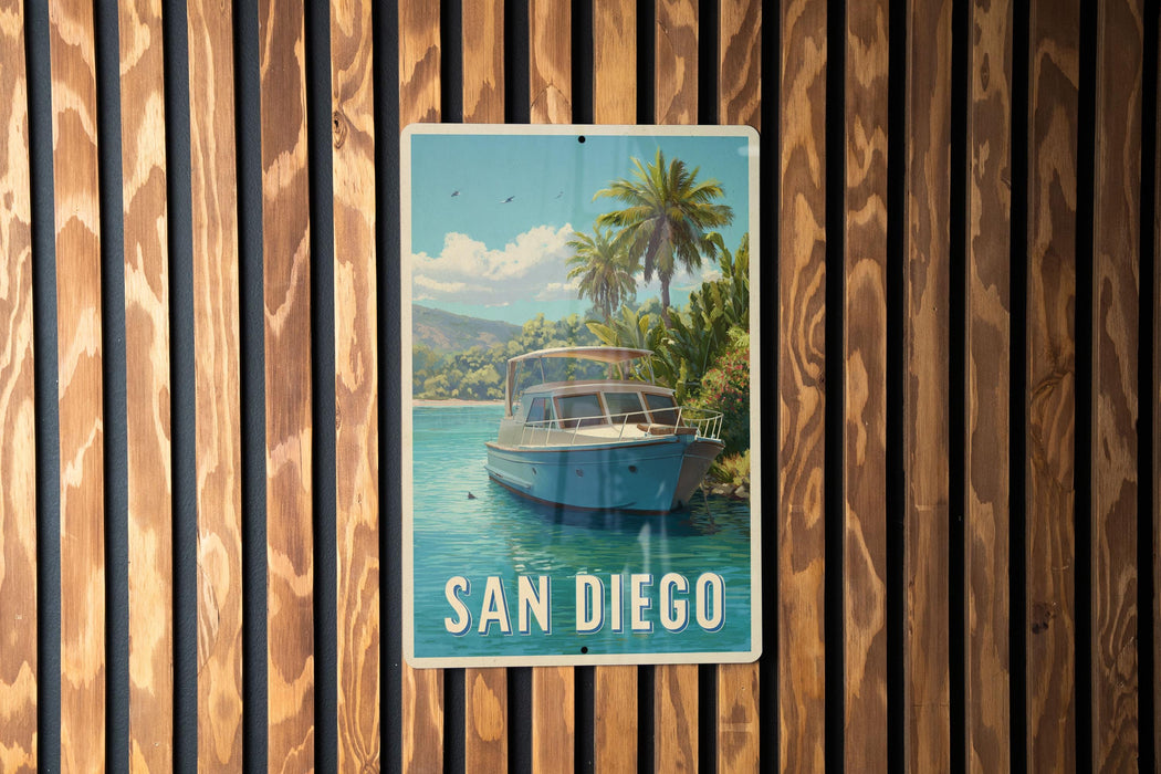 A vintage-style sign for San Diego, featuring a boat on a tropical beach with palm trees and a blue sky.