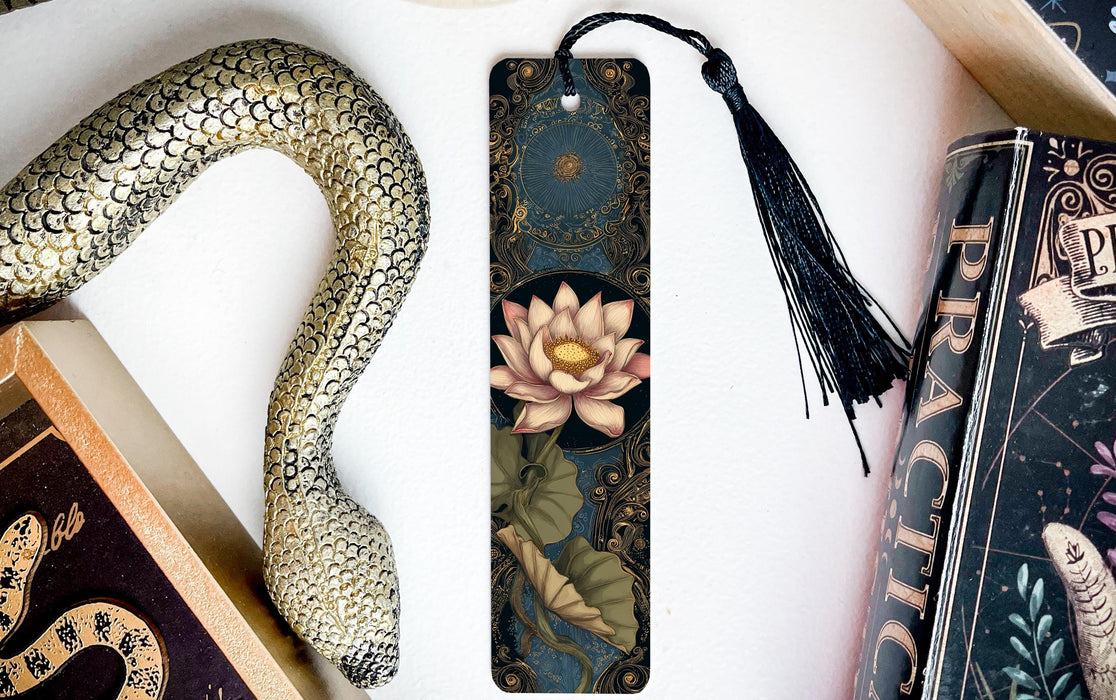 a decorative snake-shaped bookmark with a floral design, placed next to a book titled "Practice".