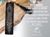 a metal bookmark with a feather design, placed on a wooden surface.
