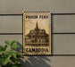 A sign displaying the name of a place, which is Cambodia, mounted on a wall.