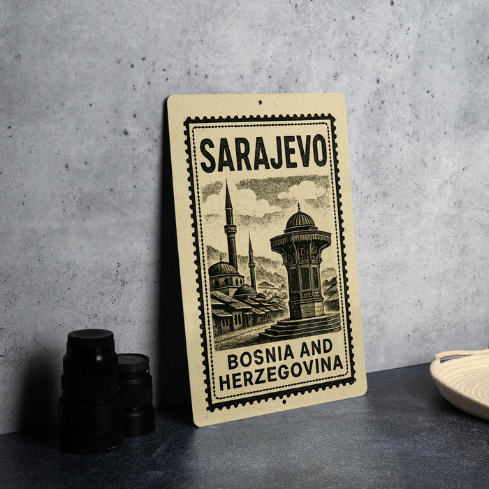 a poster or sign with the text "SARAJEVO BOSNIA AND HERZEGOVINA" and an illustration of a mosque, along with a stamp-like border.