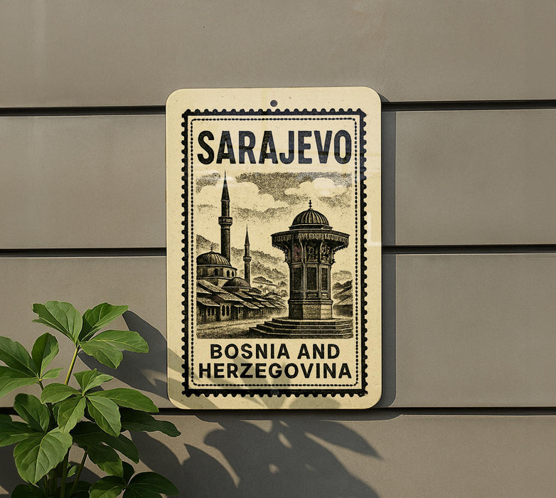 a sign with the text "SARAJEVO" and "BOSNIA AND HERZEGOVINA" printed on it, along with an illustration of a mosque and a fountain.