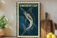 a blue and white sign with a swordfish illustration, placed on a wooden surface next to a wooden cutting board and some lemons.
