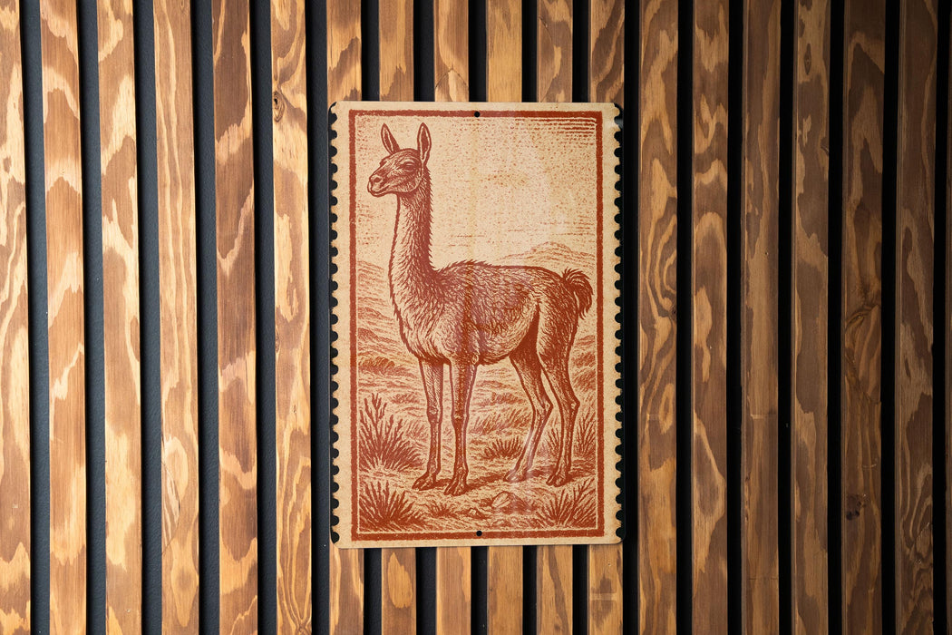 a large, detailed illustration of a llama on a wooden wall.