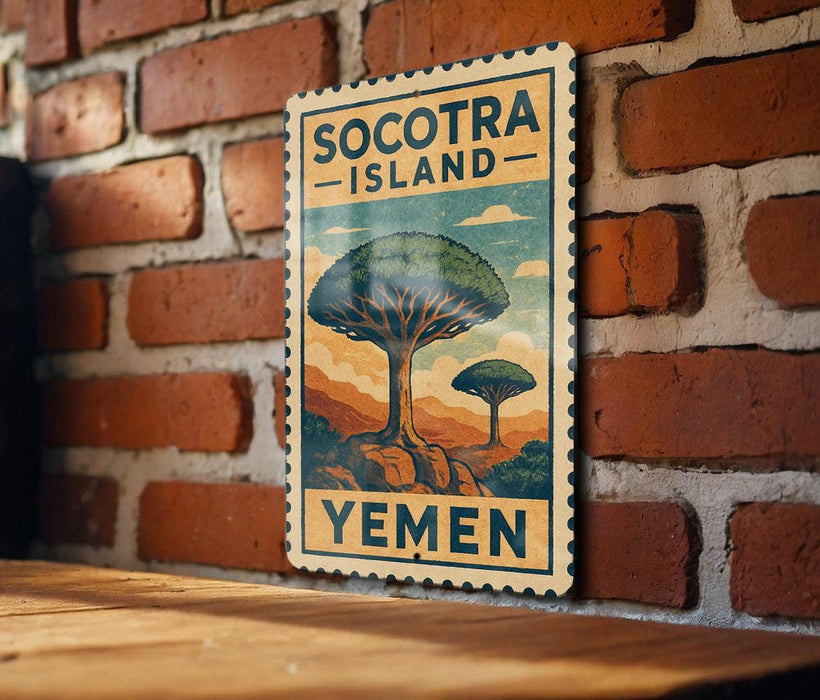 a vintage-style sign for Socotra Island, Yemen, mounted on a brick wall.