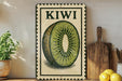 A vintage-style sign featuring a kiwi fruit illustration is displayed on a shelf, accompanied by a wooden cutting board and a potted plant.