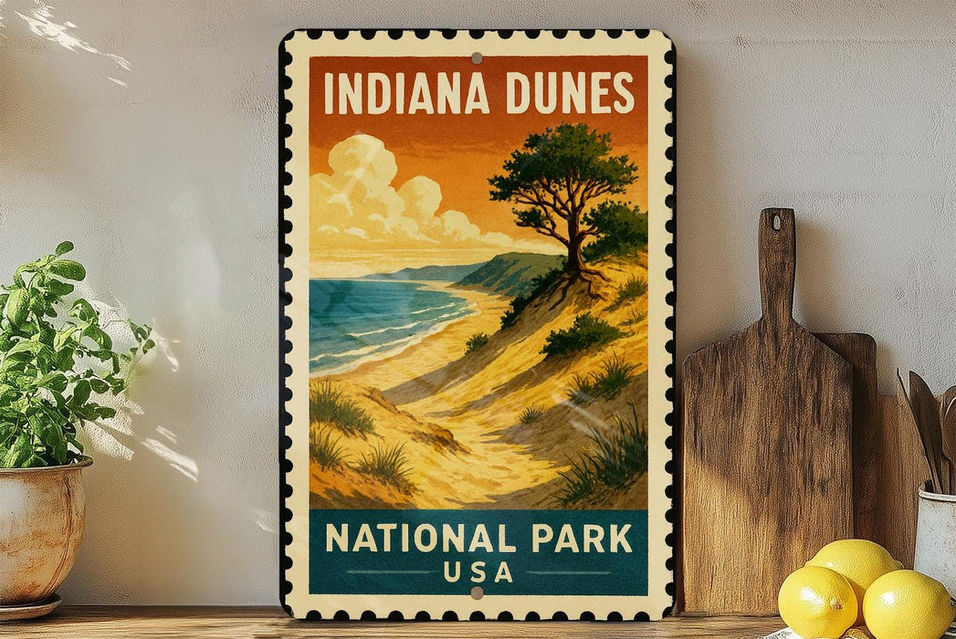 A vintage-style metal sign for Indiana Dunes National Park, featuring a scenic landscape with a beach, mountains, and a tree.