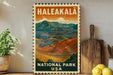 A vintage-style postage stamp depicting the scenic Haleakala National Park in the United States, with mountains and a landscape in the background.