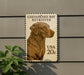 A postage stamp featuring a portrait of a Chesapeake Bay Retriever dog, with the text "CHESAPEAKE BAY RETRIEVER" and the value "20c" printed on it.