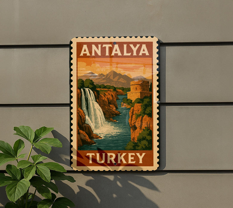 A vintage-style travel poster for Antalya, Turkey, featuring a waterfall and mountains in the background.