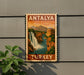 A vintage-style travel poster for Antalya, Turkey, featuring a waterfall and mountains in the background.