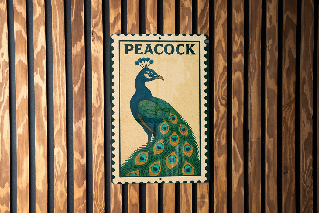 A metal sign featuring a colorful illustration of a peacock is mounted on a wooden wall.
