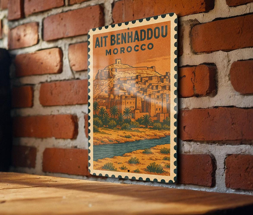 a vintage-style poster of a Moroccan city, mounted on a brick wall.