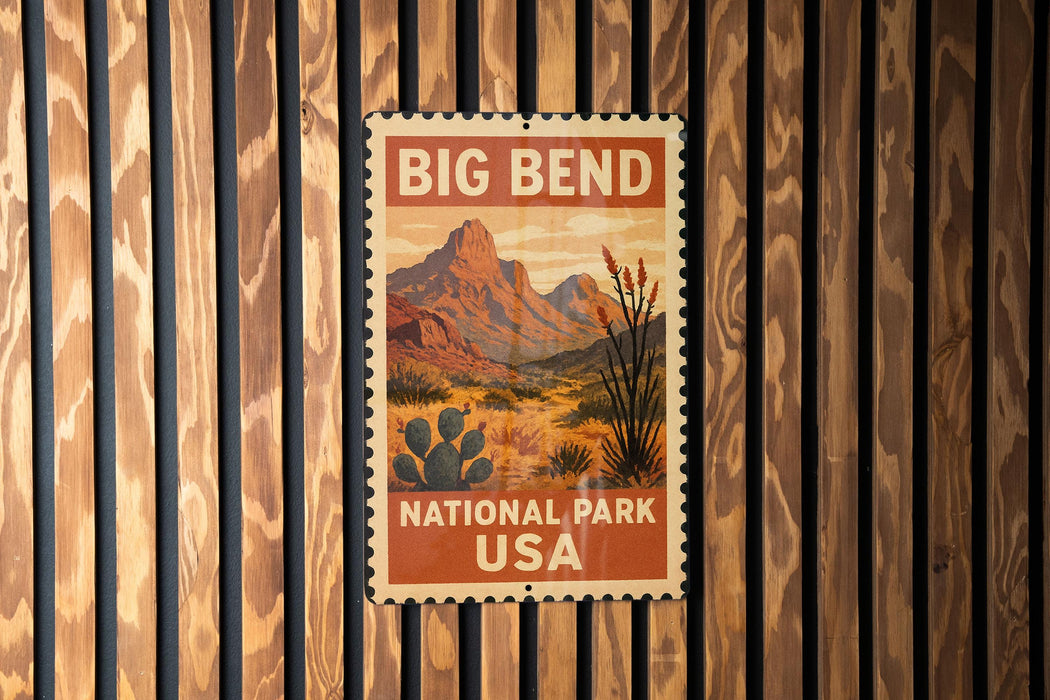 A vintage-style postage stamp featuring a desert landscape with mountains and cacti, hanging on a wooden wall.