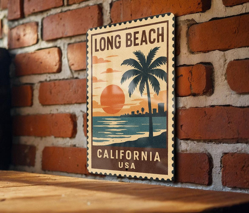 A vintage-style stamp or sign with the text "LONG BEACH CALIFORNIA USA" displayed on a brick wall.