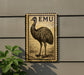 a large emu standing on a wall, with a postage stamp-like border around it.