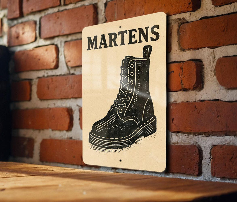 A sign with the word "MARTENS" written on it, featuring a black and white illustration of a leather boot.