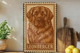 A framed image of a Leonberger dog is displayed on a shelf, accompanied by a wooden cutting board, a potted plant, and some lemons.