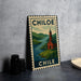 A metal sign with a vintage-style illustration of a church and a river, along with the text "CHILE" and "CHILE" written on it.