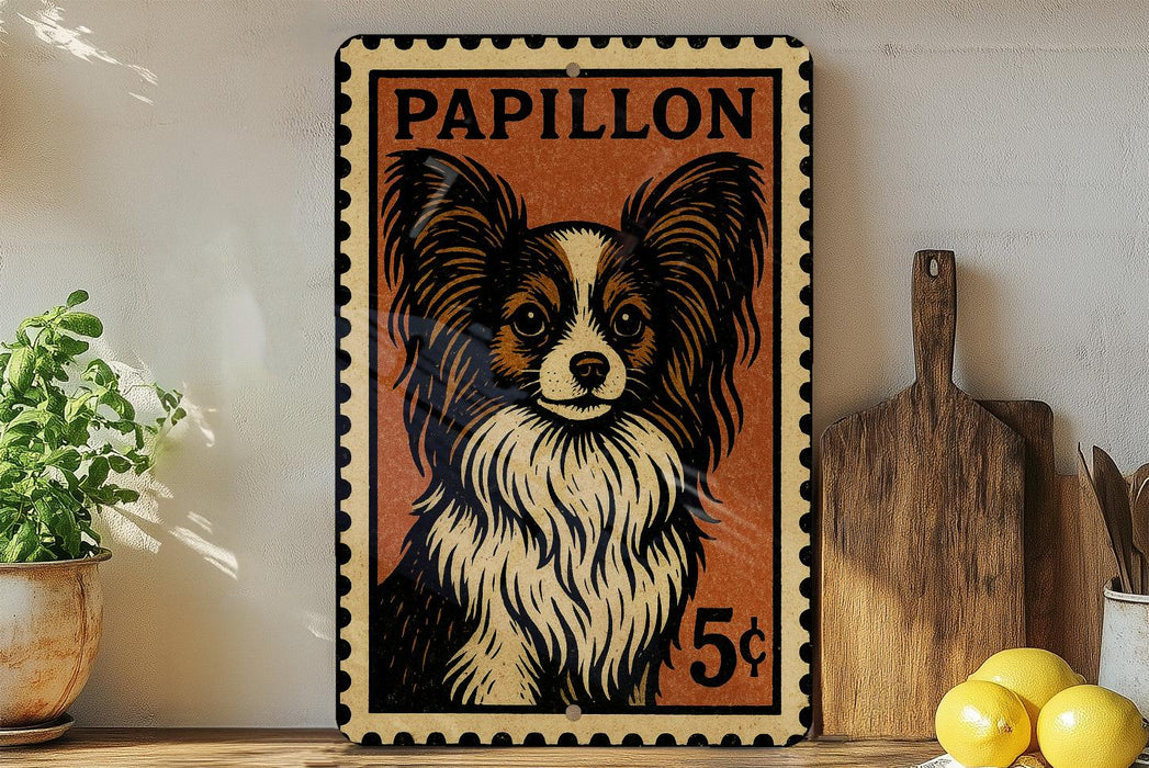 A vintage-style stamp featuring a Papillon dog, with a price of 5 cents, is displayed on a shelf next to a wooden cutting board and some lemons.